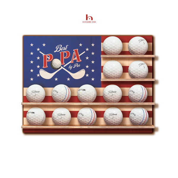 Golf ball display with 'Best Papa' text and American flag design on a white background
