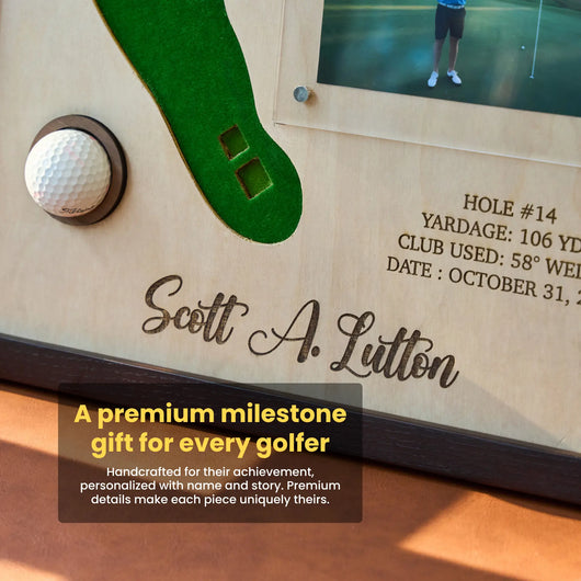 Personalized golf milestone gift with a golf ball and photo frame, featuring the name 'Scott A. Lutton'.