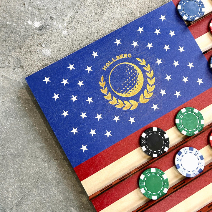 Flag with golf ball design and poker chips on a textured surface