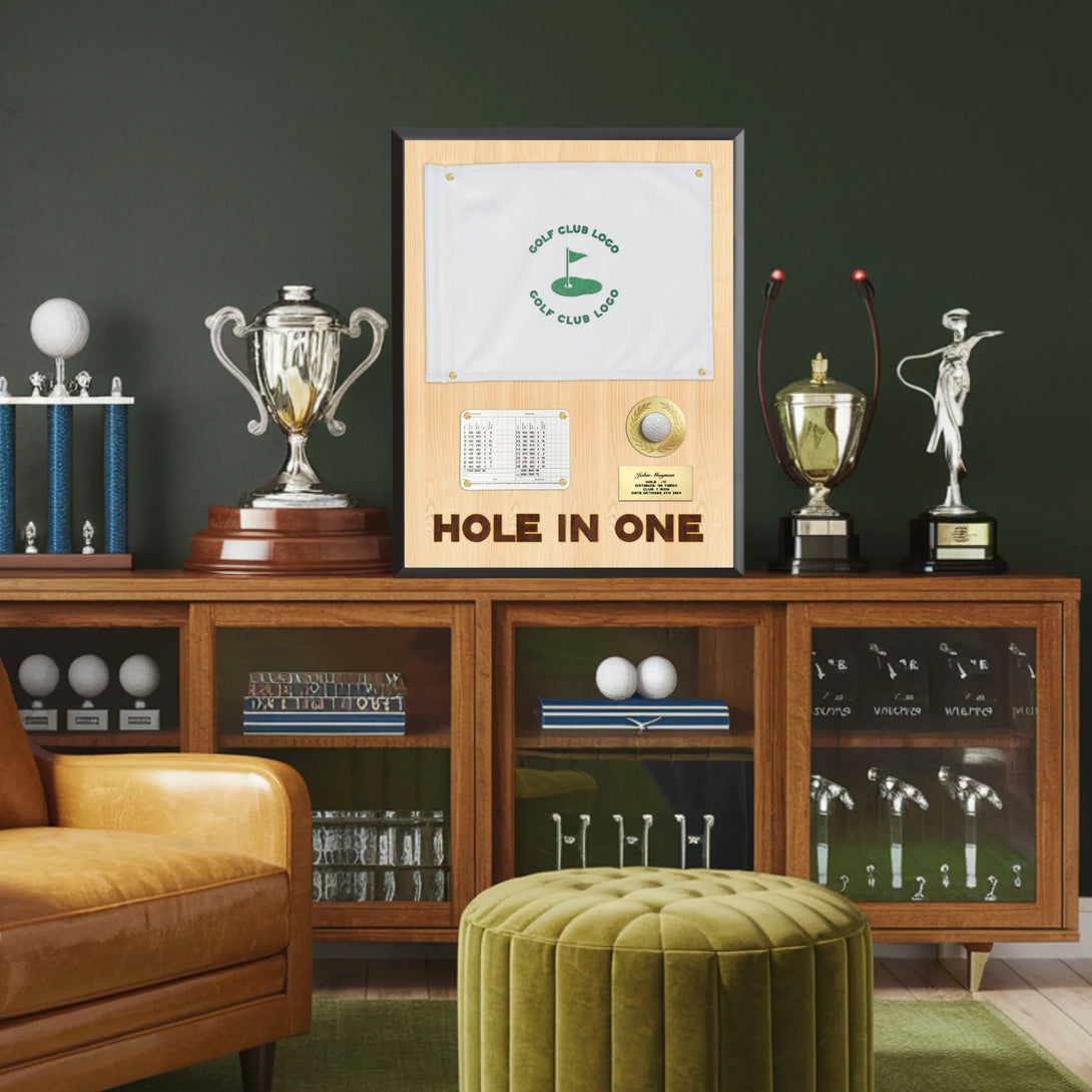 Golf-themed decor with trophies, framed picture, and golf balls on a wooden cabinet.