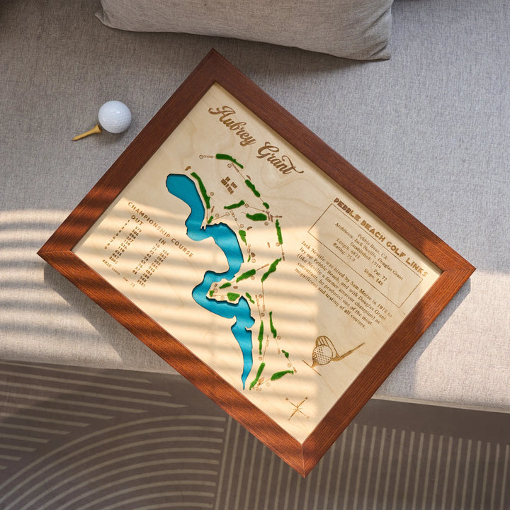Wooden golf course map with a wooden frame on a gray surface