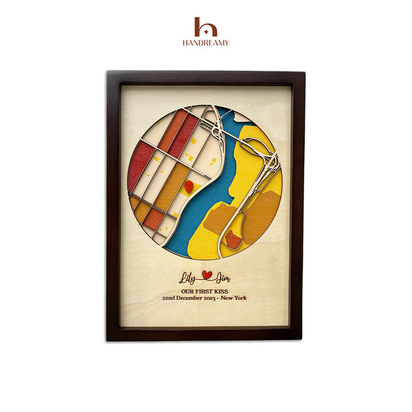Framed artwork with a colorful design and text on a beige background, featuring the brand 'Handreamy'.