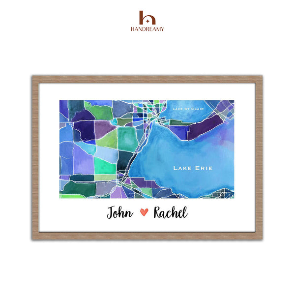 Framed map print with 'Lake Erie' and 'John & Rachel' text, featuring the Handreamy brand.